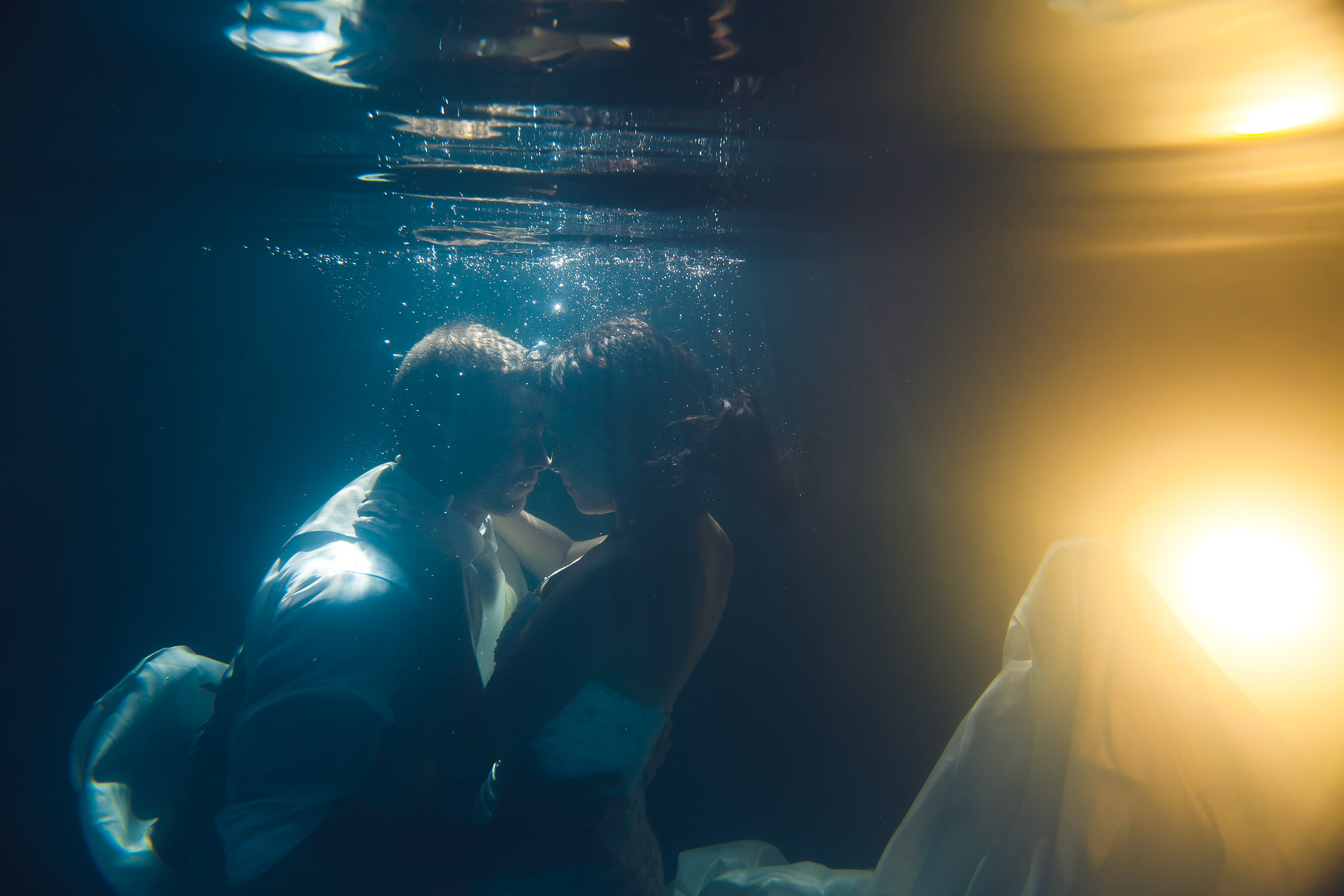underwater couple trash the dress