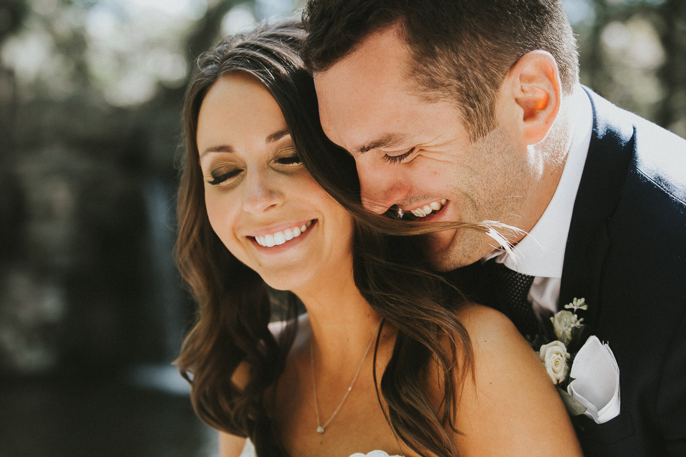 Classic couple laughing on their wedding day in Stratford, ON.
